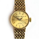 A ladies 9ct yellow gold Bueche-Girod wristwatch, on a 9ct gold bracelet, approx. 17cm diameter,