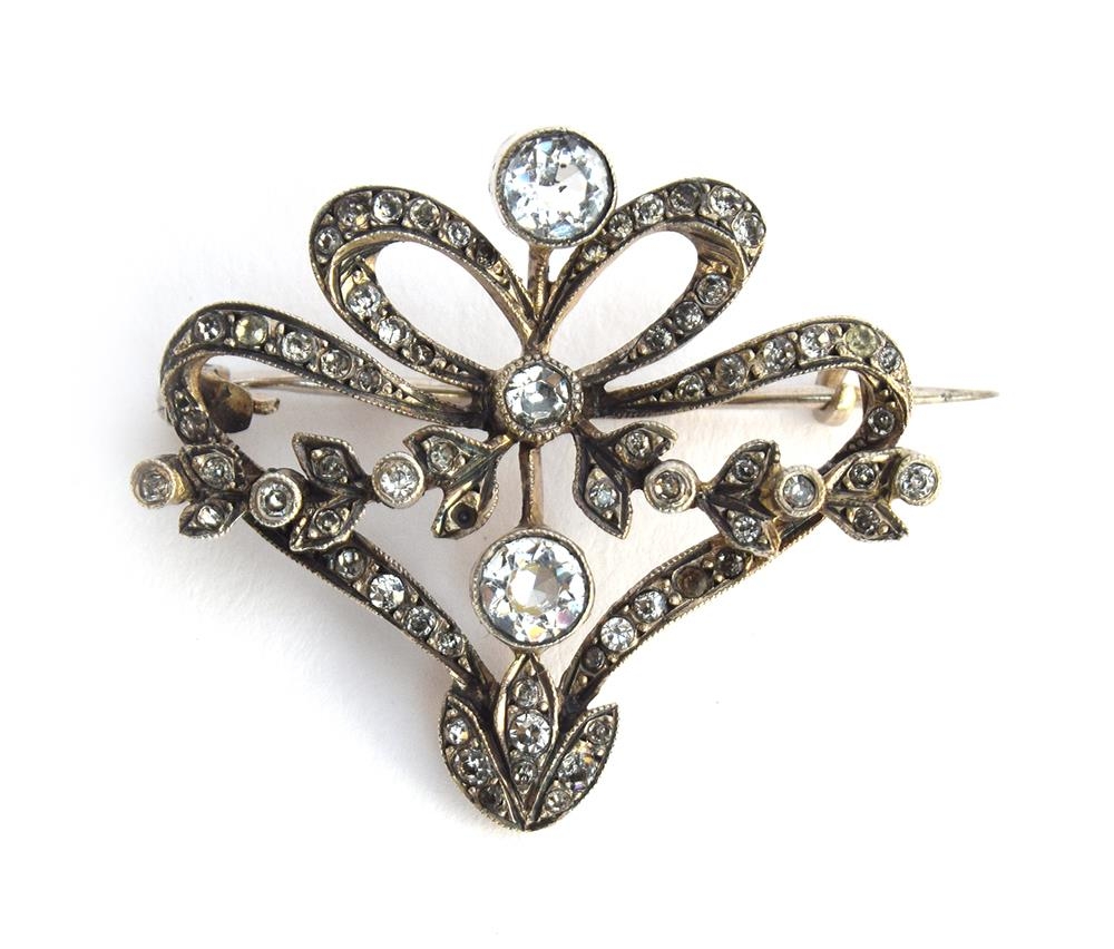 A French Belle Epoque silver and paste openwork brooch, 6.4g, 3.5cm wide