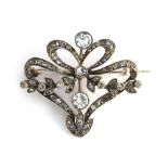 A French Belle Epoque silver and paste openwork brooch, 6.4g, 3.5cm wide