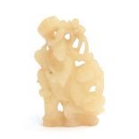 A Chinese carved white jade figure of two men, 6.2cm high