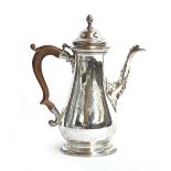 An early George III silver coffee pot, maker's mark rubbed, London 1764, baluster form, the hinged