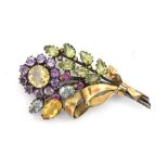 Attributed to Dorrie Nossiter, a c.1930 Arts and Crafts gem set floral brooch, set with citrines,