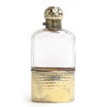 A Victorian glass and silver gilt hip flask, London 1898, hammered finish, 14cm high