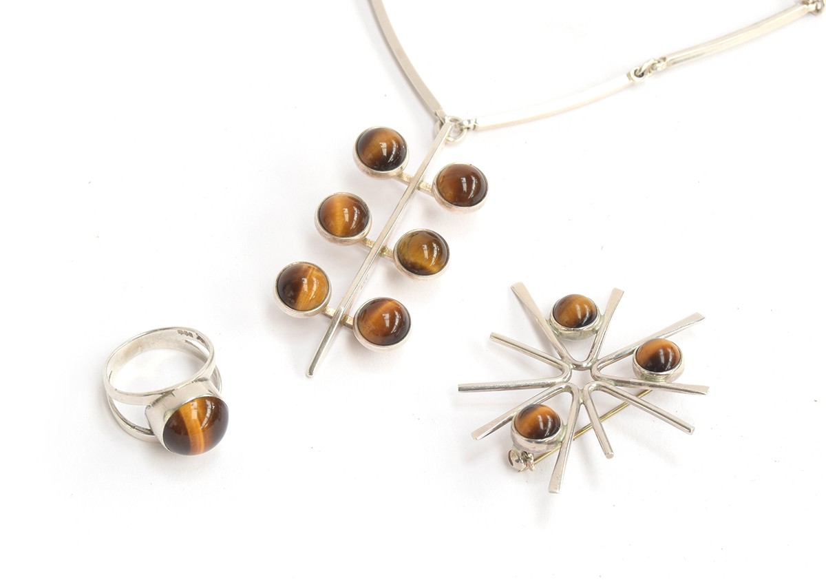 Three pieces of Modernist silver and tigers eye jewellery, comprising a necklace by Niels Erik,