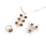 Three pieces of Modernist silver and tigers eye jewellery, comprising a necklace by Niels Erik,