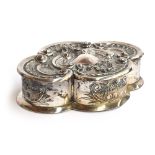 A Portuguese 833 silver jewellery box, lobed form chased in rococo taste, with a padded silk lined
