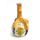 An Italian Majolica Certosa di Firenze monastic pilgrim's flask, in the form of a claw grasping an