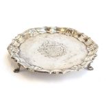 A small George II silver salver by Robert Abercromby, London 1743, engraved with central crest