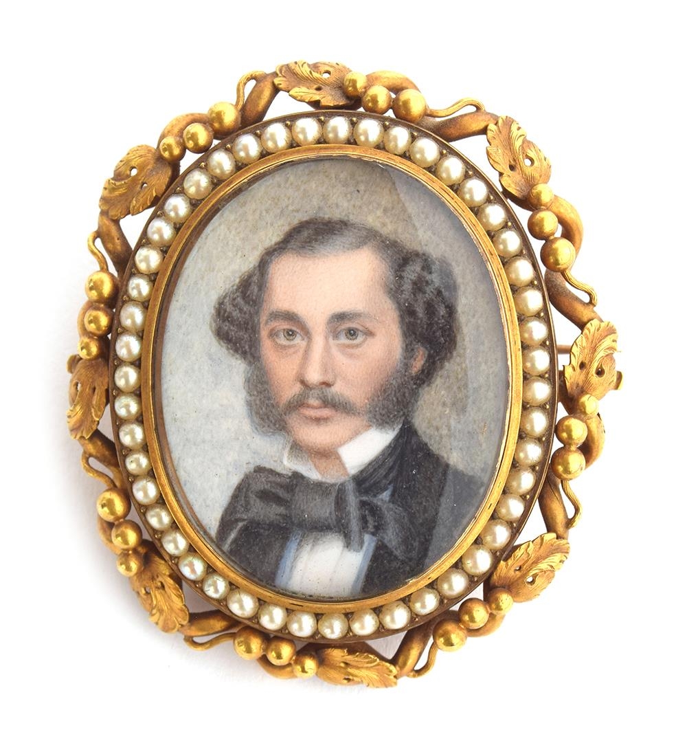 A heavy gold framed portrait miniature of a 19th century gentleman, tests as 18ct or higher,