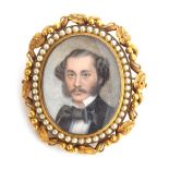 A heavy gold framed portrait miniature of a 19th century gentleman, tests as 18ct or higher,