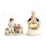 A Staffordshire figure of a seated Turk, 12cm high; together with a porcelain Putti making a pot