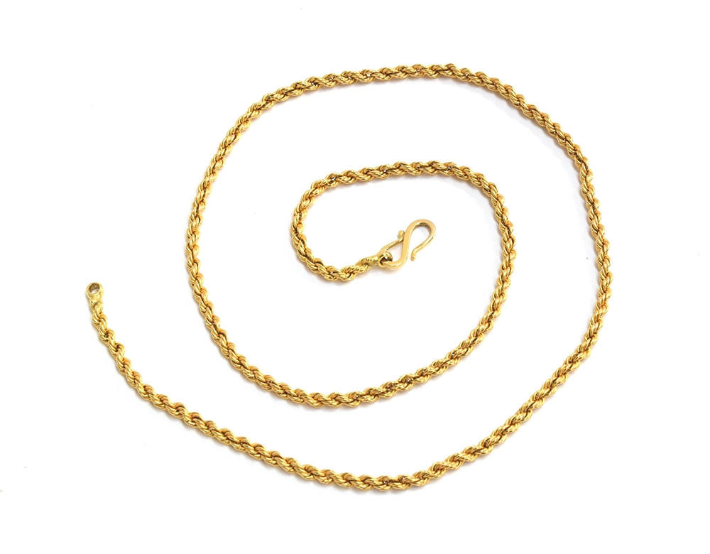A 19th century gold ropetwist chain, fastening with an S clasp, tests as 18ct or higher, 58.5cm - Image 3 of 3