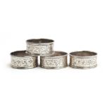 A set of four engraved silver napkin rings, Birmingham 1876, 2.1ozt