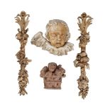 A group of architectural fragments, 18th and 19th centuries, comprising; a pair of limewood carved