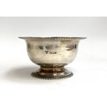 A silver George VI rose bowl with gadrooned edge, hallmarked for London, F T Ray & Co, 1937, 13cm di