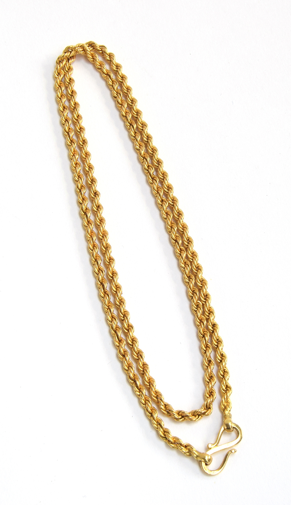 A 19th century gold ropetwist chain, fastening with an S clasp, tests as 18ct or higher, 58.5cm