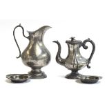 A Finstain pewter ewer, 31cm high, together with a pair of Finstain pewter dishes, 14.5cm