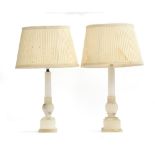 A near pair of Italian turned alabaster table lamps, capped column on square plinths, 42.5cm high to