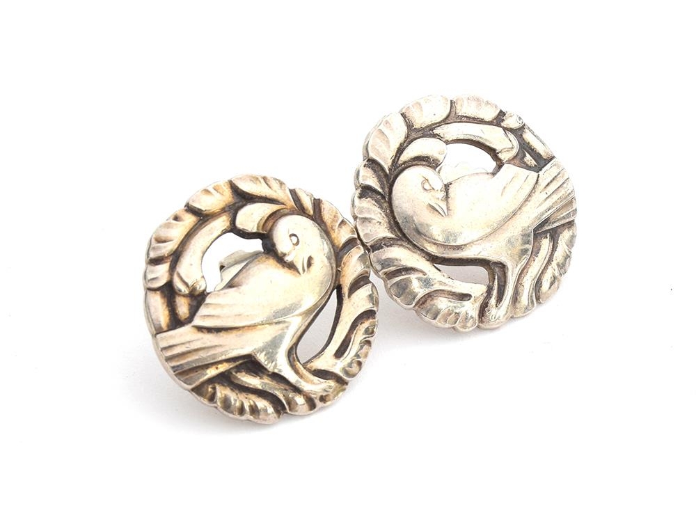 A pair of silver Georg Jensen dove stud earrings, stamped no. 66, designed by Kristian Moehl-Hanson,