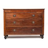 A French mahogany and cross banded commode chest of three drawers, c.1800, the frieze with secret