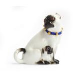A 19th century Meissen figure group of a pug and puppy (af), modelled after J.J Kändler, the pug