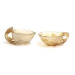 Two Chinese translucent agate libation cups, each with handle in the form of a climbing tiger, the