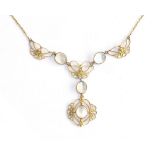 An Art Nouveau 15ct gold, moonstone and seed pearl necklace, approx. 8.1g, 40cm long
