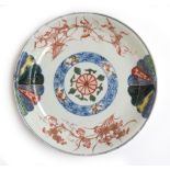 A 19th century porcelain Imari dish, with polychrome fan design, heightened in gilt, 16.5cm diameter