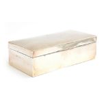 An early 20th century silver cigarette box by Joseph Gloster Ltd, Birmingham, of rectangular form