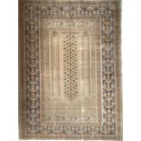 A Turkish panderma style rug with floral column design in muted tones, 165x123cm