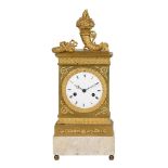 A 19th century French gilt metal mantel clock, eight-day movement striking on a bell, the case