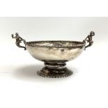 An Edwardian twin handled silver rose bowl, the figural handles cast as a mermaid and merman, hallma