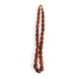 A graduated cognac amber bead necklace, approx. 59g, 57cm long