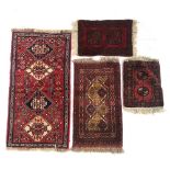 A lot of four small rugs, the largest 69x133cm