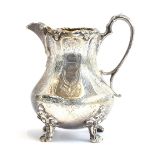 A Victorian milk jug by Daniel & Charles Houle, London 1861, 14.5cm high, 9.4ozt