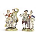 Two Dresden porcelain figurines of dancing couples, the taller 22cm high