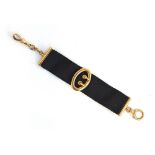 A late Victorian black silk mourning fob, with 18ct gold bolt clasp, lobster clip and decorative