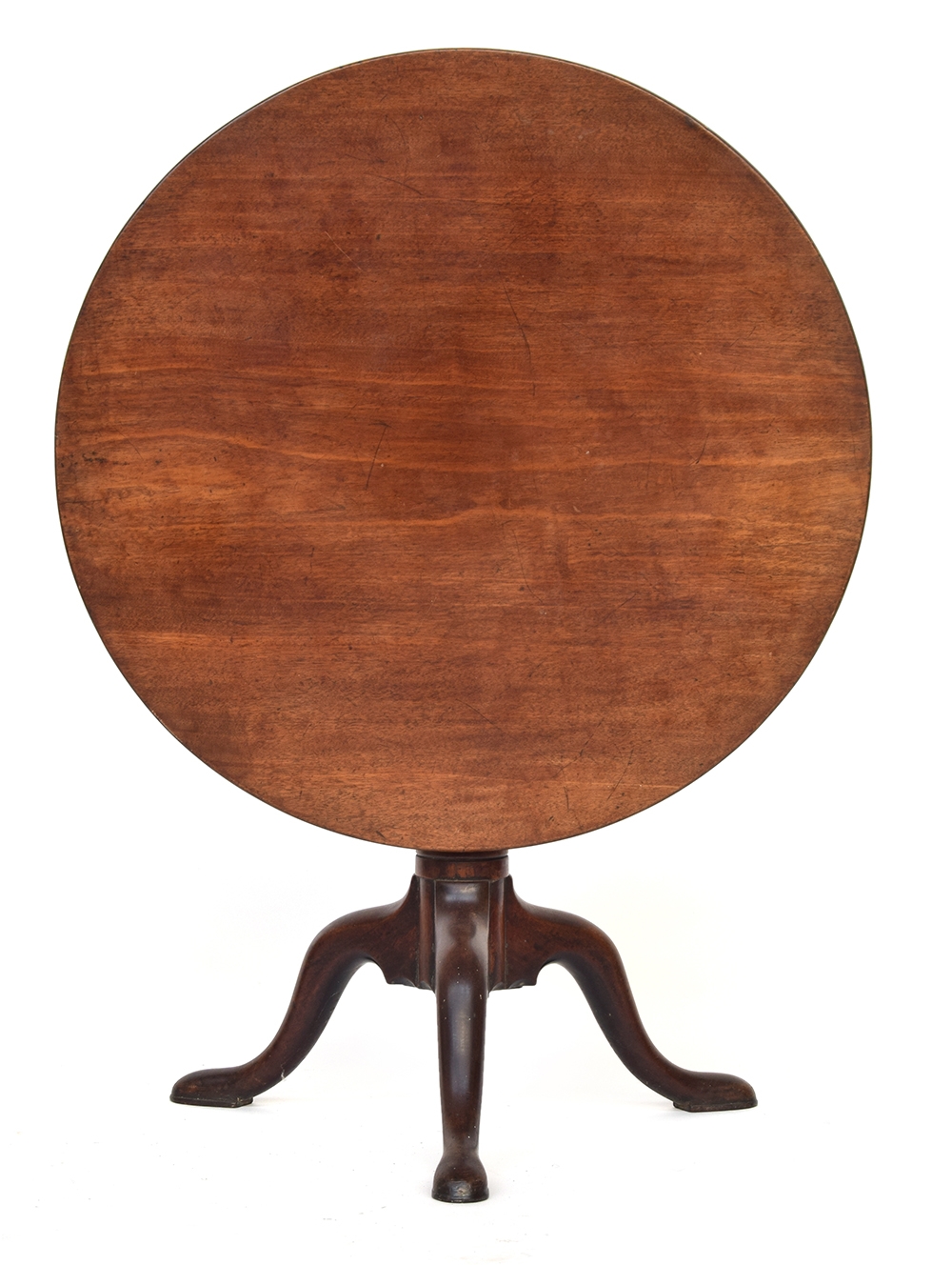 A George III mahogany tripod table, tip-top with birdcage action, gun barrel column support on three