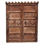 An Indian cabinet, two panelled doors, converted with a hanging rail, 111cm wide, 50cm deep, 139cm