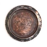 An Arts & Crafts hammered copper dish by Hugh Wallis (1871-1943), with alternating copper and