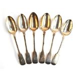 A lot of six fiddle pattern dessert spoons, five marked SS, London 1850, the sixth by Thomas Hart