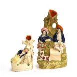 Two Staffordshire flatback spill vases, one in the form of a sleeping shepherd and dog, 12cm high;