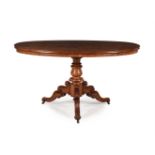 A Victorian mahogany centre table, circa 1860, the oval top above a turned stem and tripod base,
