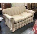 A two seater sofa, upholstered in a striped cream 153cmW