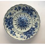 A blue and white Delft charger, c.1961, 28cm diameter, marks to base