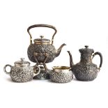 A Whiting Manufacturing Co four piece American sterling silver tea set, comprising teapot on stand