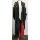 A small silk kimono with red lining