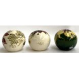 Three Moorcroft for Liberty pomanders, dated 1983, 1984 and 1985, each approx. 7cmH