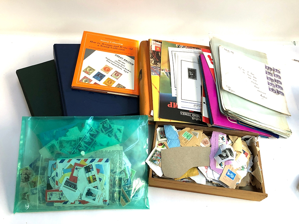 A quantity of stamps in albums and loose to include presentation packs, first day covers, The Sunday