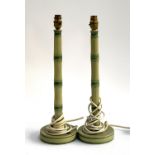 A pair of green painted faux bamboo table lamps, 47cmH to top of fitting; together with a further